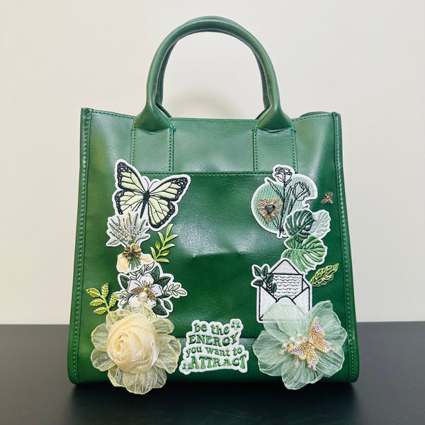 One-of-a-kind hand-embellished DALINEO bag with floral, pearl, and crystal details