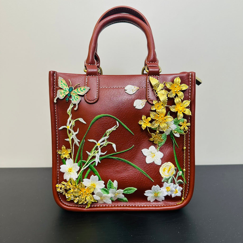 One-of-a-kind hand-embellished DALINEO bag with floral, pearl, and crystal details